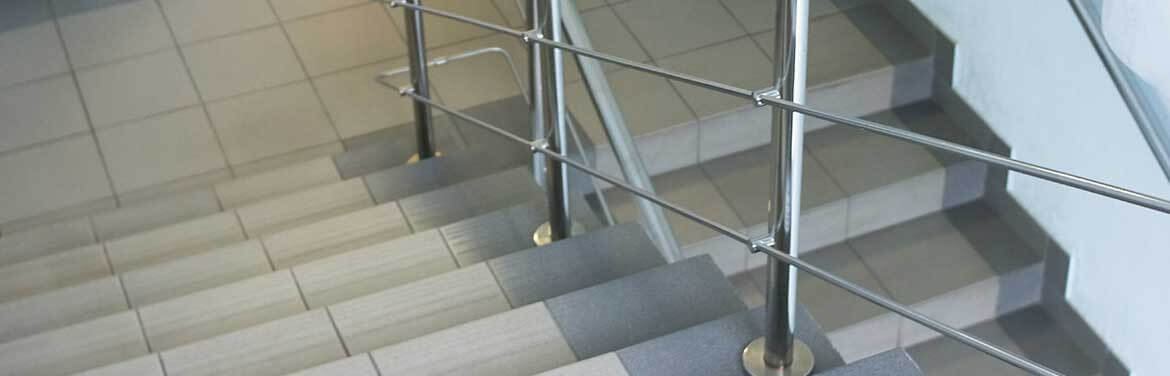 clean staircase with chrome railing