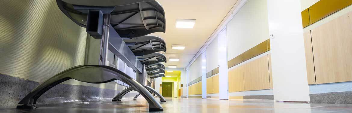 hospital hallway with row of chairs